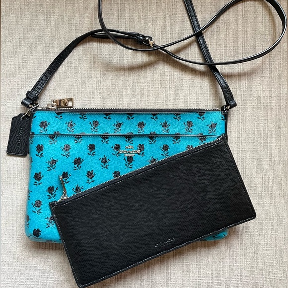 Coach Handbags - Coach blue/black leather floral print crossbody bag with pop up pouch.